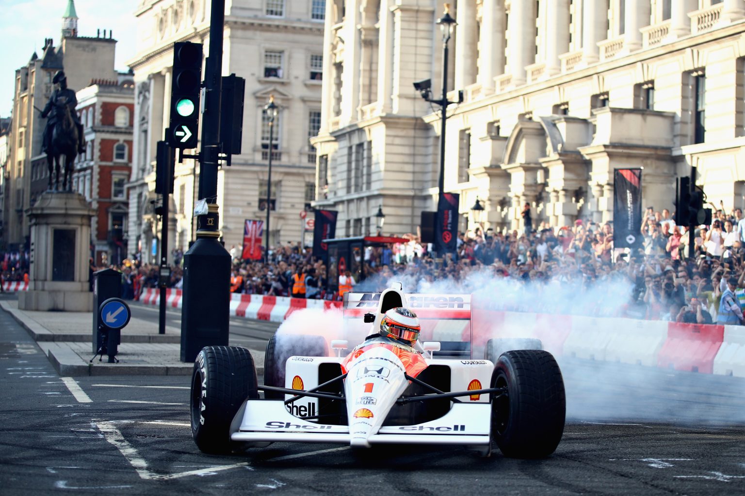 LONDON, ENGLAND - JULY 12:  Stoffel Vandoorne of Belgium and McLaren Honda driving the McLaren MP4-6 during F1 Live London at Trafalgar Square on July 12, 2017 in London, England.  F1 Live London, the first time in Formula 1 history that all 10 teams come together outside of a race weekend to put on a show for the public in the heart of London.  (Photo by Clive Mason/Getty Images for Formula 1) *** Local Caption *** Stoffel Vandoorne